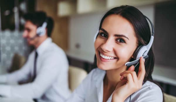 Receptionist smiling at the camera